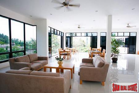 Karon Hill | Walk to the Beach from this Luxurious One Bedroom Sea View Condo for Sale