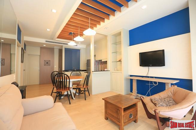 Noble Reveal Condominium | Two Bedroom Corner Condo with Wrap Around Windows and Fantastic City Views in Ekkamai-1
