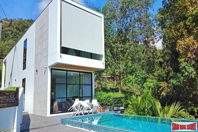 Modern Private Three Storey Pool Villa for Sale in a Lush Rawai Landscape