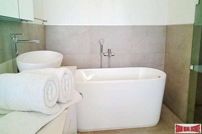 Modern Private Three Storey Pool Villa for Sale in a Lush Rawai Landscape