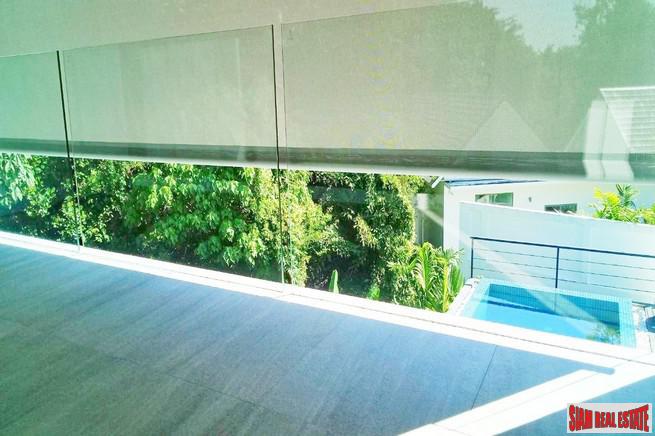 Modern Private Three Storey Pool Villa for Sale in a Lush Rawai Landscape