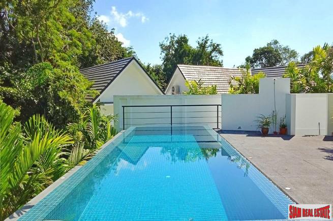 Modern Private Three Storey Pool Villa for Sale in a Lush Rawai Landscape