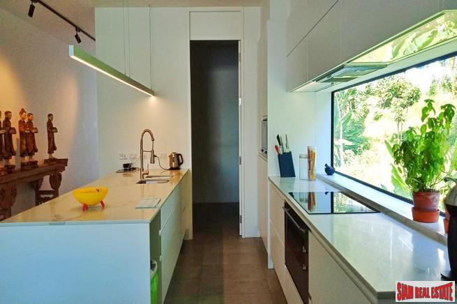 Modern Private Three Storey Pool Villa for Sale in a Lush Rawai Landscape