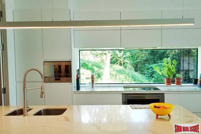 Modern Private Three Storey Pool Villa for Sale in a Lush Rawai Landscape