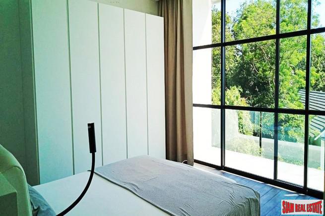 Modern Private Three Storey Pool Villa for Sale in a Lush Rawai Landscape