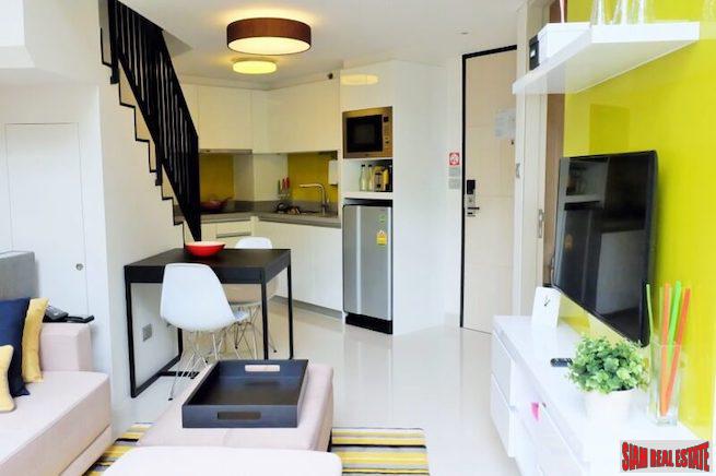 Cassia Residence | Bright Two Storey One Bedroom Condo for Sale in Laguna with Lagoon Views