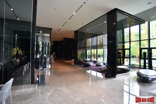 Rhythm Sukhumvit 36 | Comfortable One Bedroom Thong Lo Condo for Rent with City & Pool Views-1