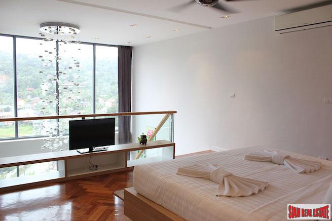 Icon Park Condominium | Two Bedroom Kamala Duplex with Large Open Windows and Green Views
