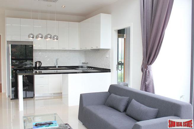 Icon Park Condominium | Two Bedroom Kamala Duplex with Large Open Windows and Green Views